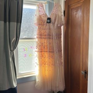Never worn beautifully embroidered Needle and Thread dress in a size 16